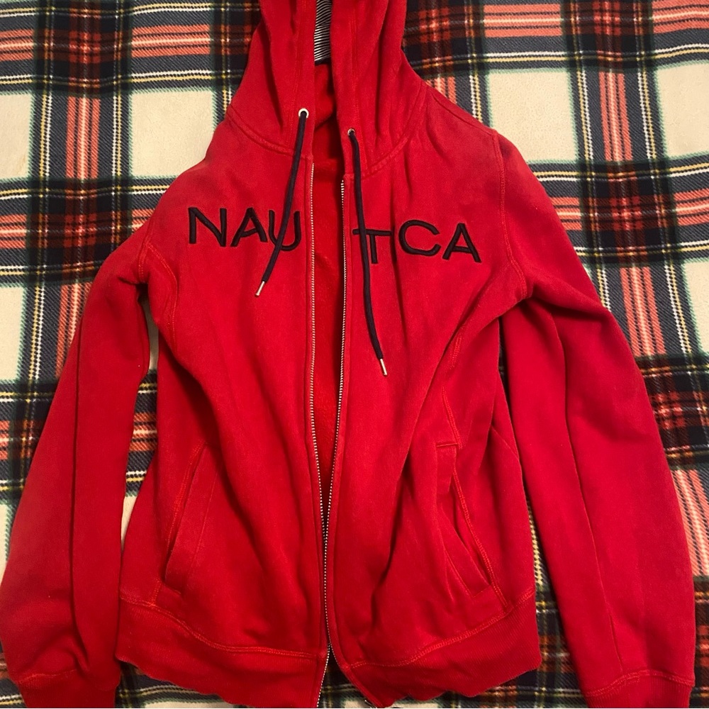 Red Nautica zip up hoodie with a dark blue and white striped hood